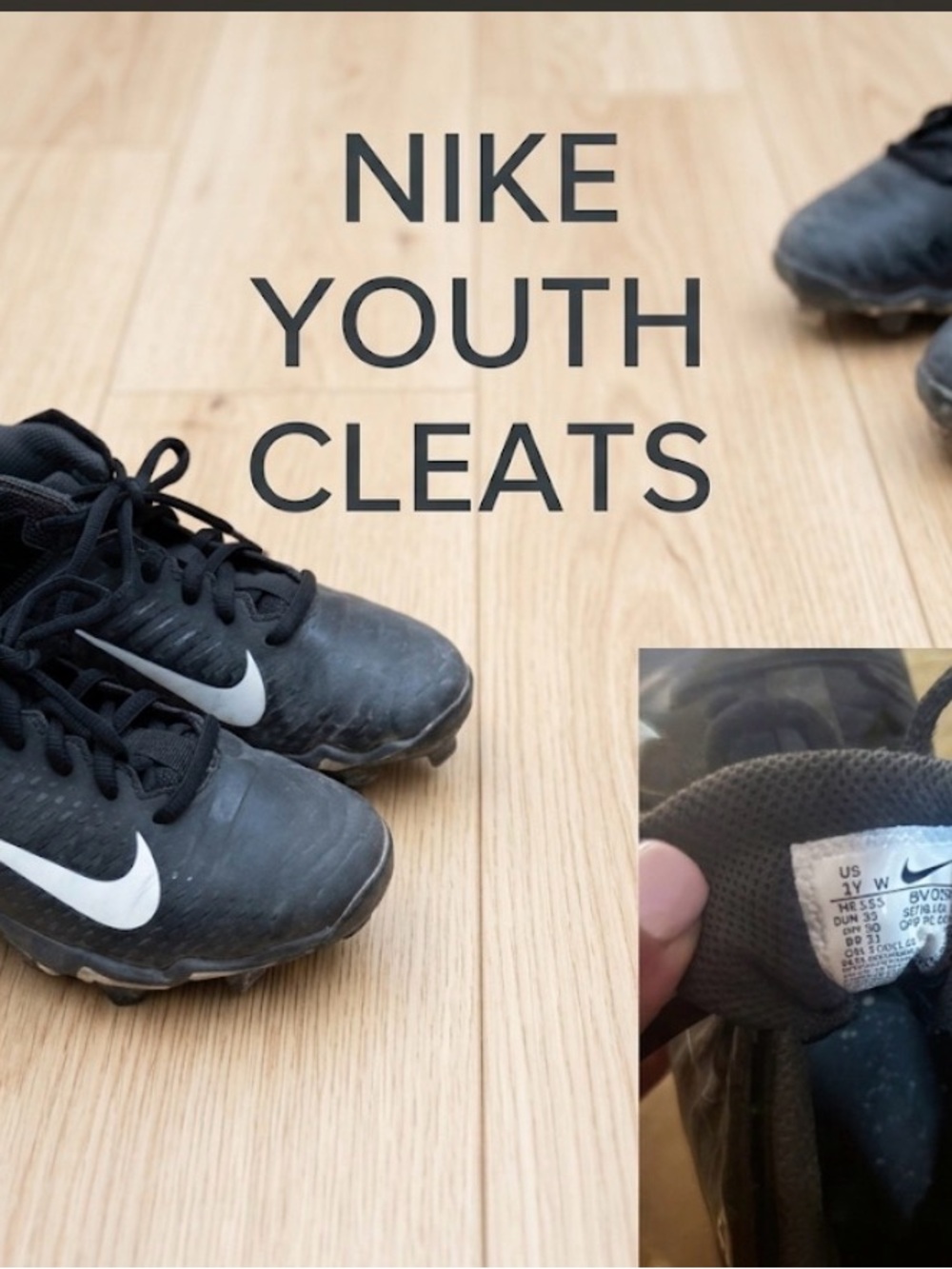 Nike Black Youth Cleats with White Swoosh Accent